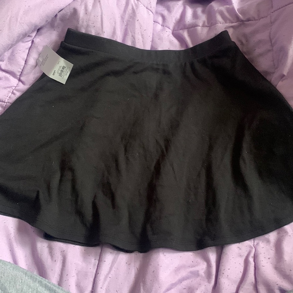 black skirt with zipper up the back